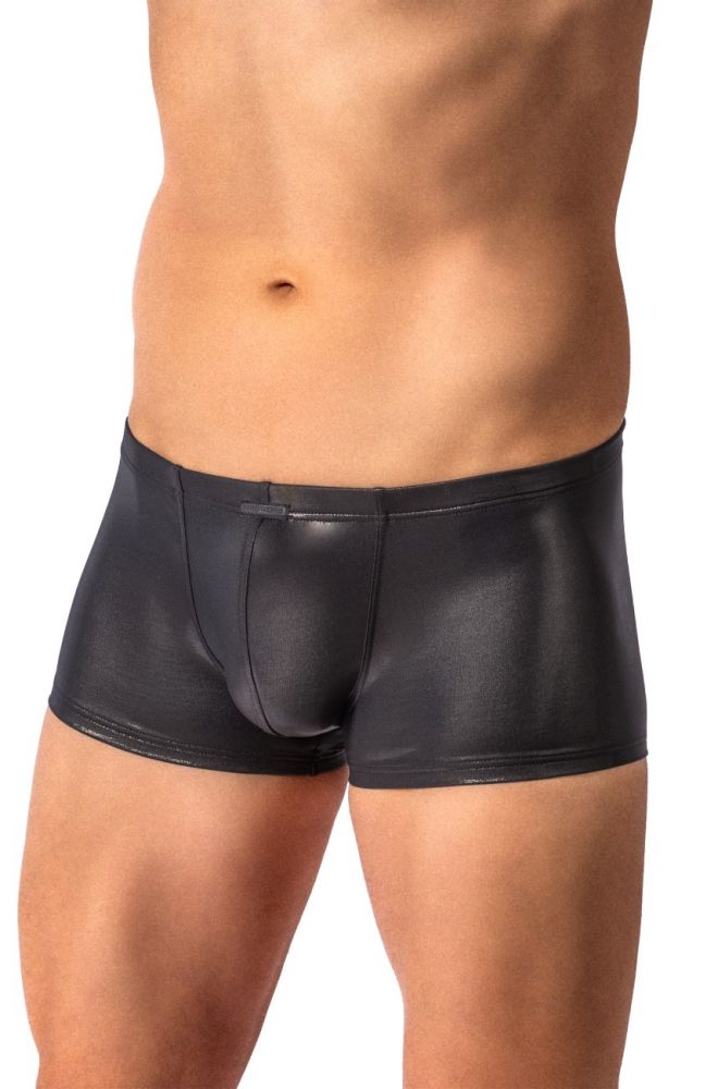 A close-up of a male model's lower torso wearing black leather-like briefs against a plain white background.