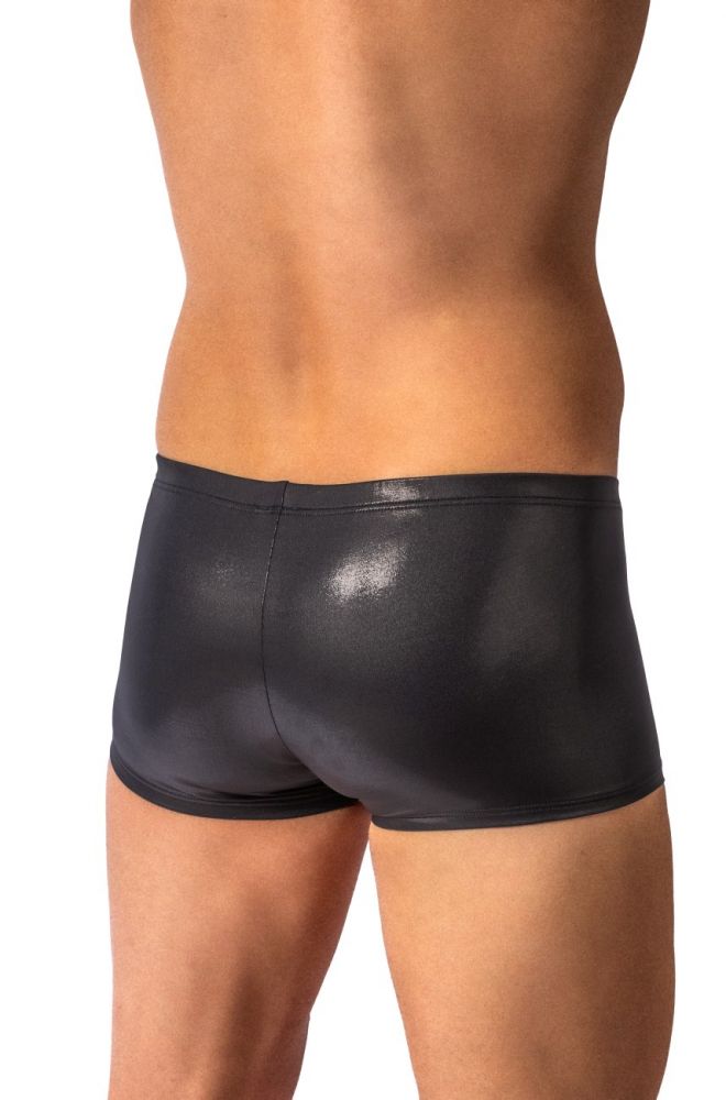 Rear view of a male model wearing black shiny briefs against a plain white background.