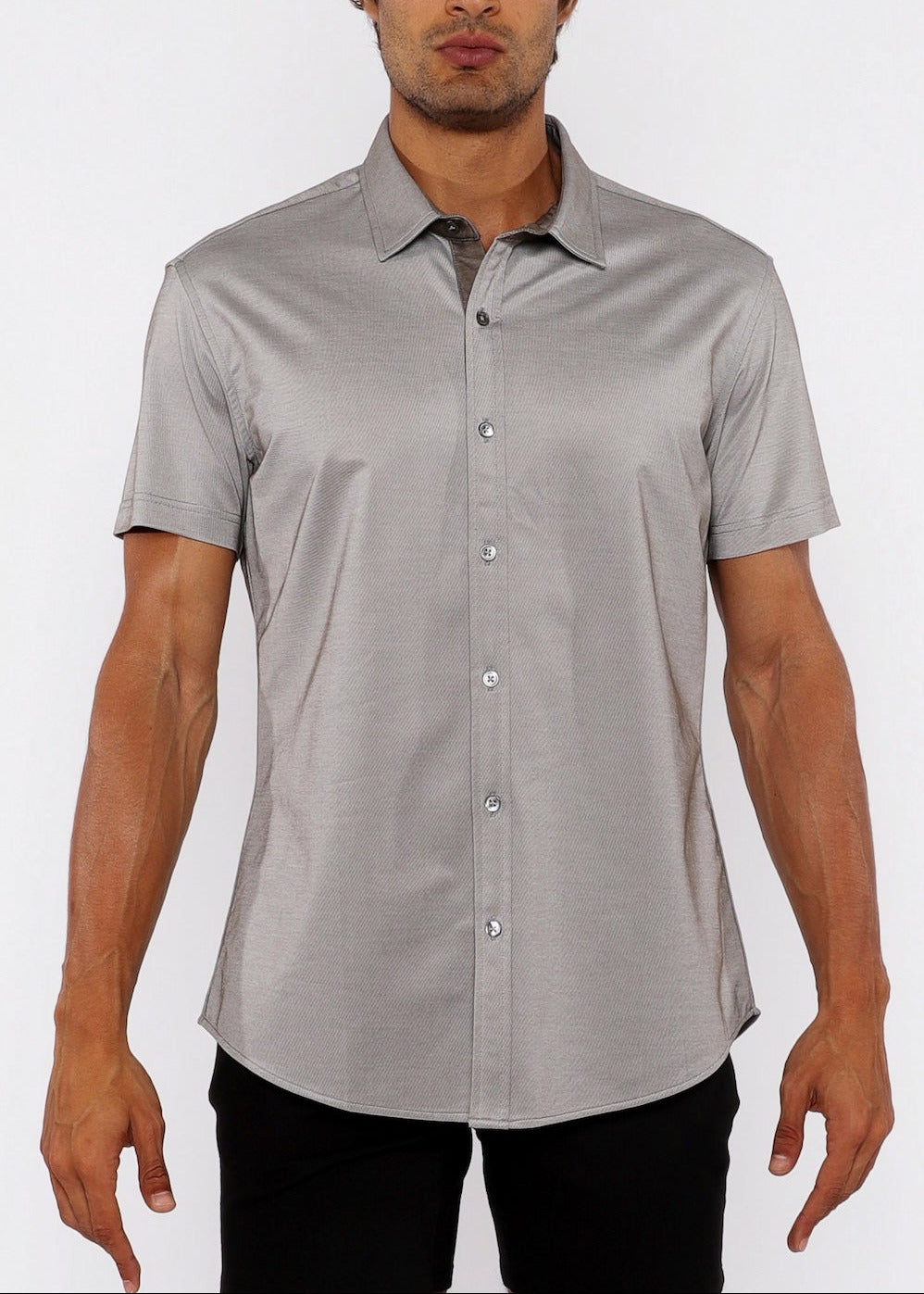 Man wearing a gray short-sleeve shirt on a white background