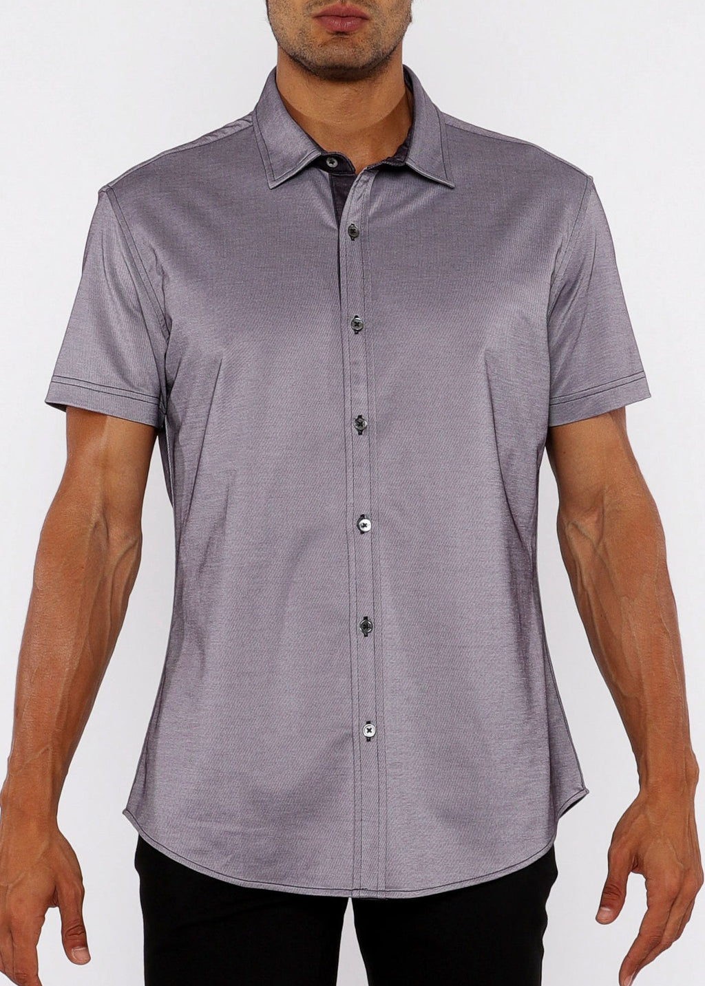 Man wearing a gray short-sleeve shirt on a white background